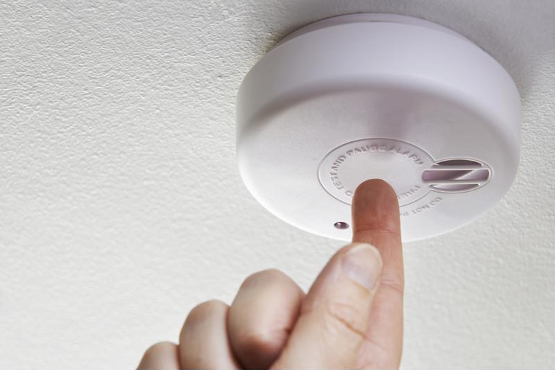 Testing your smoke detector is a smart way to ensure it's functioning properly.